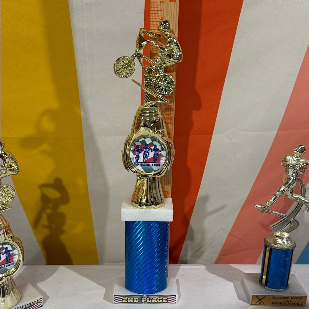 Gold and Blue Sports Trophies-bike and baseball